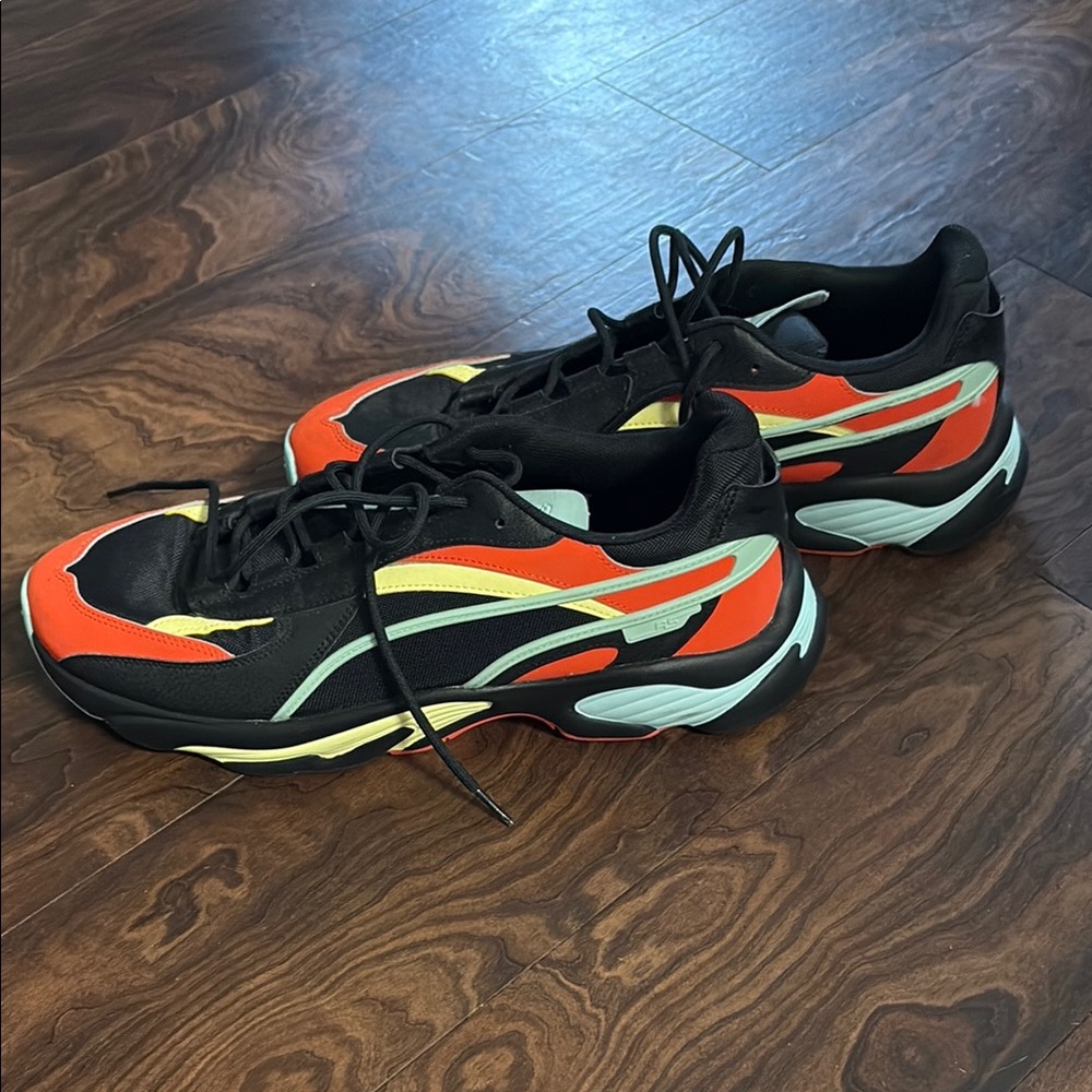 Puma Black and Orange Sneakers